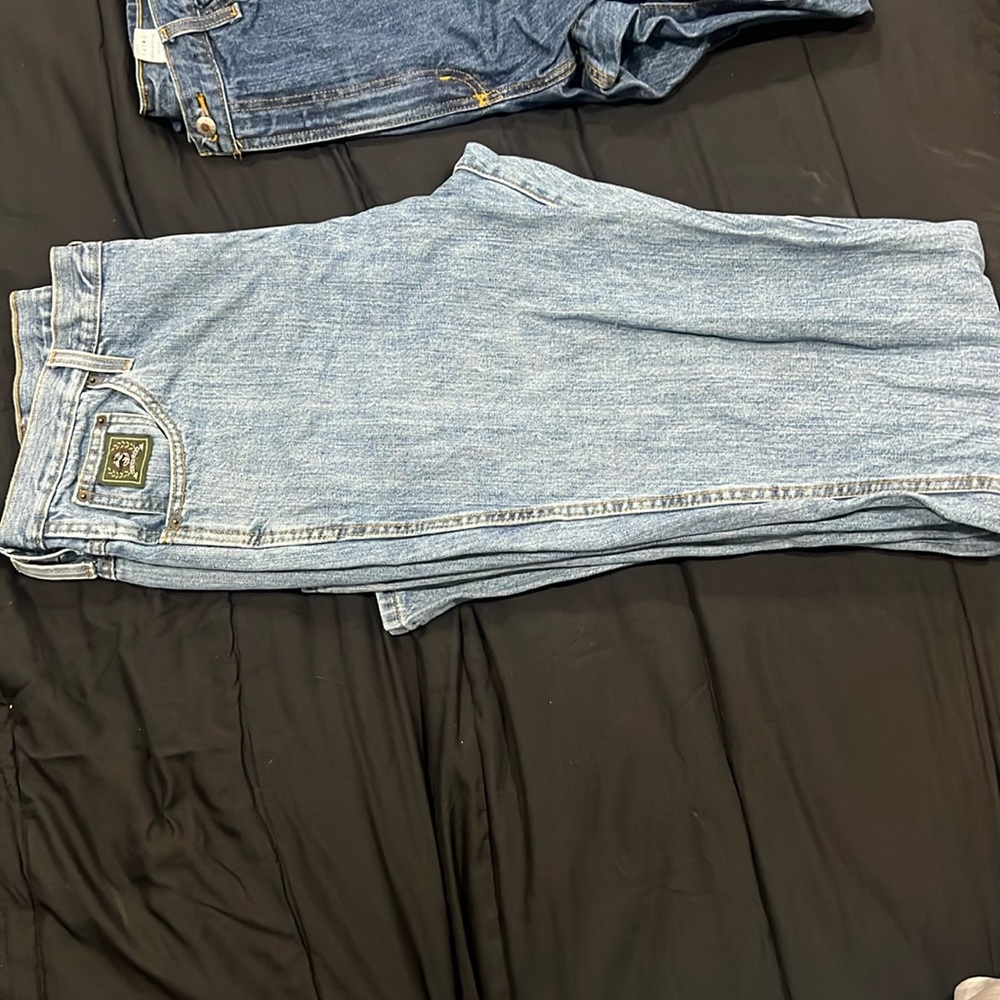 Selling cinch jeans size 38/40
